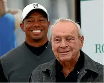  ??  ?? Golf great Tiger Woods pictured with ‘‘The King’’ Arnold Palmer at St Andrews in Scotland, in 2015.