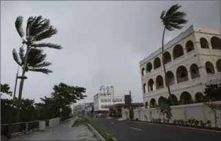  ?? ALEX WROBLEWSKI, GETTY IMAGES ?? Streets stand empty as residents prepare for a direct hit from hurricane Maria in San Juan, Puerto Rico.