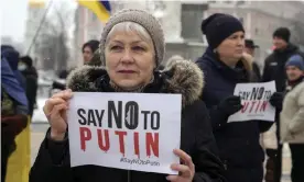  ?? Efrem Lukatsky/AP ?? Activists protest against Russian aggression at a rally in Kyiv on 9 January. Photograph: