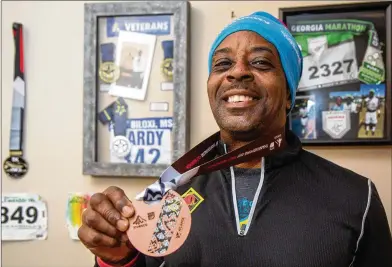  ?? PHIL SKINNER / FOR THE AJC ?? Eugene Hardy Jr. has medaled in the National Veterans Golden Age Games, and intends to compete again this summer. Hardy never stopped running and training. In fact, he believes he could play for the Atlanta Falcons.