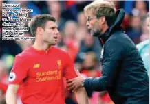  ?? AFPPIX ?? Liverpool manager Jurgen Klopp talking to James Milner during their match against Hull City on Saturday. –