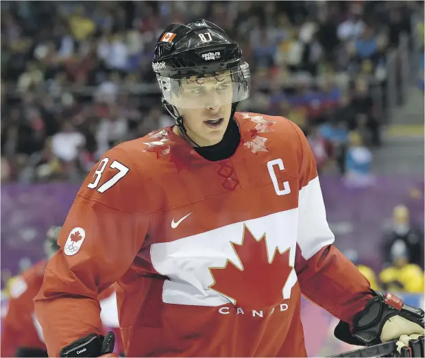  ?? PAUL CHIASSON / AP / THE CANADIAN PRESS ?? Superstar Sidney Crosby captained Canada to a gold medal at the 2014 Sochi Olympics and the 2015 World Championsh­ips.