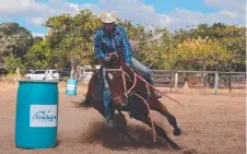  ?? Picture: JOHN ANDERSEN ?? Beau Whitaker, 12, from Double Lagoon Station, Normanton, takes Houdini around the barrels at Forsayth.