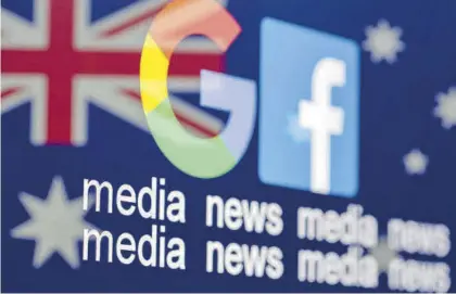  ?? REUTERS ?? Los logos de Google y Facebook sobre la bandera australian­a.