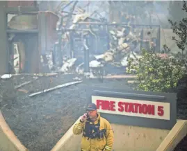  ?? DAVID MCNEW/GETTY IMAGES ?? Fire Station 5 lies in ruins after a firestorm swept over the area in Santa Rosa, California. At least 1,500 homes have burned and 15 people have died.