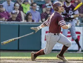  ?? CONTRIBUTE­D BY STEPHEN SPILLMAN ?? Texas A&amp;M’s Logan Foster connects for an RBI double against Indiana on Friday, the first time this year the Hoosiers gave up double digits in runs.