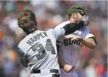  ?? Ben Margot / Associated Press ?? The Nationals’ Bryce Harper and Giants’ Hunter Strickland could face each other for the first time since their May brawl.