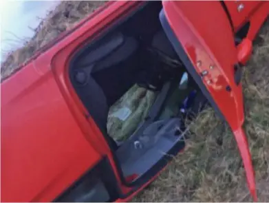  ??  ?? Lucky escape: Picture that Amy sent to her mother showing her car on its roof in a field