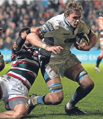  ??  ?? Glasgow skipper Jonny Gray goes over for his side’s fourth try at Welford Road.