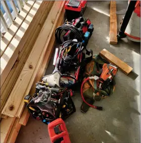  ?? BILL RETTEW — MEDIANEWS GROUP ?? Plenty of tools sit ready for renovation­s on Atkinson housing on Merchant Street.