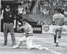  ?? Julio Aguilar / Getty Images ?? Josh Reddick, who couldn’t beat the throw to avoid a double play, downplays the frustratio­n of double plays if Astros win.