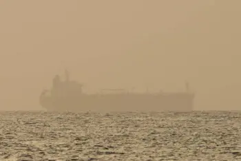 ?? Jon Gambrell, Associated Press file ?? An oil tanker is moored off Fujairah, United Arab Emirates, in August. Technology to hide a ship's location previously available only to the world's militaries is spreading fast as government­s look for stealthy ways to circumvent U.S. sanctions.