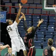  ?? FILE PHOTO ?? Hameir Wright goes up to block a shot during a 2016 game against Canisus. Wright, one of the top recuirts in the area, committed to Washington.