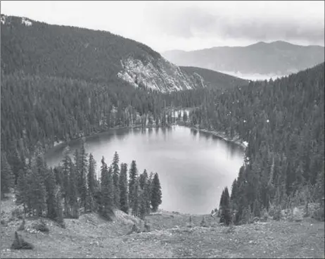  ?? PHOTO BY DAN BUDNIK ?? Blue Lake near Taos, New Mexico. Harold D. Walter Collection. Palace of the Governors Photo Archive, New Mexico History Museum, Santa Fe, New Mexico; Negative number 154284. Blue Lake is off-limits to non-tribal members.