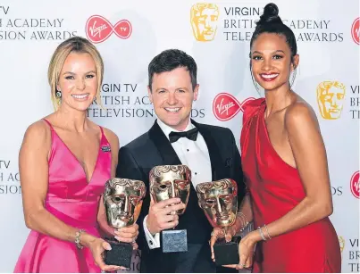  ?? Picture: PA. ?? Declan Donnelly, Alesha Dixon and Amanda Holden collect the award for Best Entertainm­ent programme for Britain’s Got Talent.