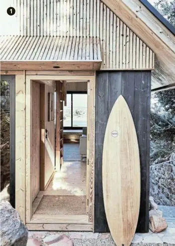  ?? ?? 1 At the front door is a Wawa Wooden Surfboard, handcrafte­d in Muizenberg. The surfboard is an extension of Alexander’s interest in local timber craft and manufactur­ing.