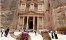  ??  ?? Tourists outside Petra’s treasury in 2015. Jordanian authoritie­s are developing plans to market Petra as a safe destinatio­n. Photograph: Khalil Mazraawi/AFP via Getty Images