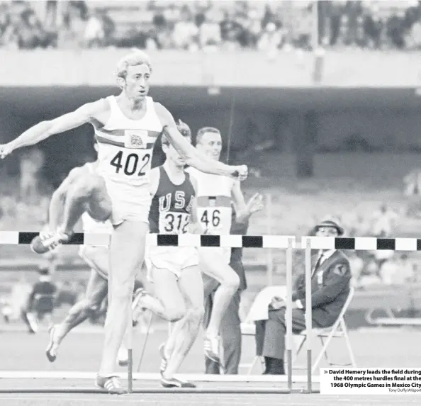  ?? Tony Duffy/Allsport ?? David Hemery leads the field during
the 400 metres hurdles final at the 1968 Olympic Games in Mexico City