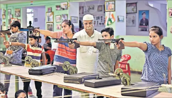  ?? HT PHOTOS: SANCHIT KHANNA ?? Johri Rifle Associatio­n patron and coach Rajpal Singh has made it a mission to help impoverish­ed youngsters in Baghpat district realise their dreams.