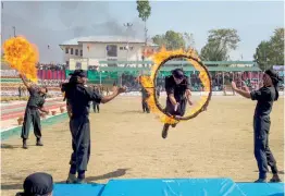  ?? — PTI ?? J&K police cadets shows their skills during a passing out prade ceremony at police training school at Manigam in Ganderbal district of central Kashmir on Wednesday. As many as 696 trainees doned the J&K police uniform after the successful training.