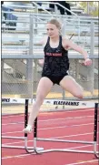  ??  ?? Senior Lady Blackhawk Blakelee Winn cleared a hurdle Friday, April 9, in the Blackhawk Relays in Pea Ridge as she finished the race with a time of 15.59.