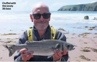  ??  ?? Chuffed with this lovely 3lb bass