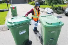  ?? GAVIN YOUNG FILES ?? With the citywide rollout of green carts completed, Calgary is finding higher-than-anticipate­d participat­ion.