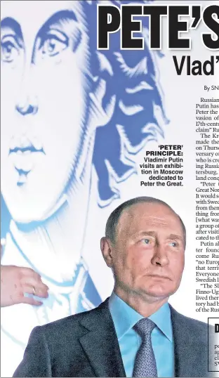  ?? ?? ‘PETER’ PRINCIPLE: Vladimir Putin visits an exhibition in Moscow dedicated to Peter the Great.