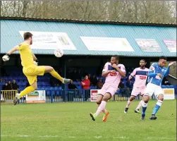  ??  ?? UP AND AWAY: Angels keeper Jonathan Henly clears under pressure