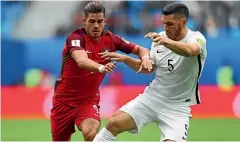  ?? GETTY IMAGES ?? All Whites central defender Michael Boxall, right, in action against Portugal in 2017.