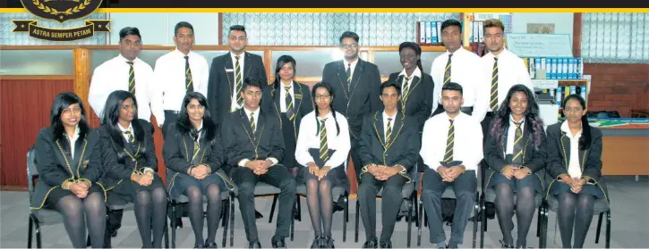  ??  ?? Some of the 19 Kharwastan Secondary School learners who achieved five or more subject distinctio­ns. Seated (from left): Nereshnie Naidoo (7As), Thea Govender (7As), Shannon Govender (7As), Kiash Maharaj (7As), Nishanta Ramlall (8As), Thana Pather (7As), Sanjog Sing (7As), Darne Pillay (7As), Yasti Sing (7As). Standing (from left): Jarelle Venkatasu (5As), Akeel Maharaj (5As), Juhaim Ebrahim (6As), Andrika Sudhoowa (6As), Bhavesh Singh (6As), Praise Adejimi (5As), Santhiran Naidoo (5As), Nivaan Koobair (5As).