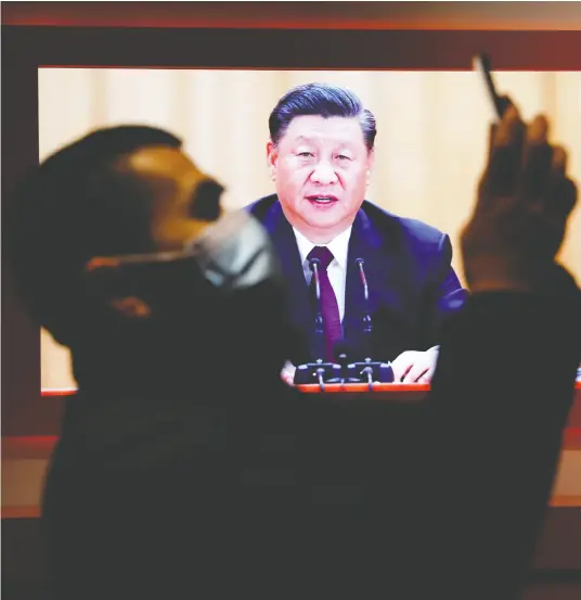  ?? TINGSHU WANG / REUTERS FILES ?? China has made efforts to shape world opinion and distract from China’s human rights and freedom of speech abuses since Xi
Jinping, seen on screen in China, became General Secretary of the Chinese Communist Party in 2012.