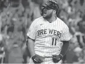  ?? STACY REVERE/GETTY ?? Brewers’ Rowdy Tellez celebrates hitting a two-run homer in the seventh inning of Game 1 of the NLDS on Friday at American Family Field in Milwaukee.