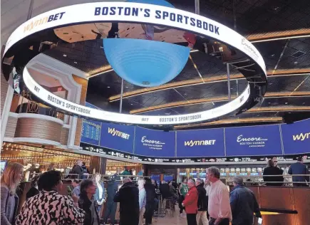  ?? STEVEN SENNE/AP ?? A total of 33 states and the District of Columbia now offer at least some form of sports wagering – each scrambling for shares of a multibilli­on-dollar enterprise. This is the Encore Boston Harbor casino in Everett, Mass.