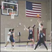  ?? JOHN SANDERS Valley Press Sports Correspond­ent ?? Vasquez’s Adrian Abarghoei (4) shoots against Desert Christian in the Heritage League opener for both teams on Thursday at Vasquez High. The Mustangs won 58-20.