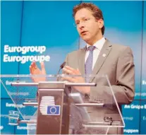  ??  ?? Eurogroup president Jeroen Dijsselblo­em said Greece’s debt will be sustainabl­e if its servicing does not exceed 15 percent of the country’s GDP.