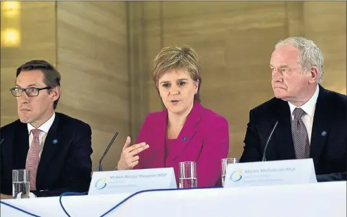  ??  ?? SPEAKING OUT: Jersey Chief Minister Ian Gorst, left, and Northern Ireland Deputy First Minister Martin McGuinness listen as First Minister Nicola Sturgeon makes her case.