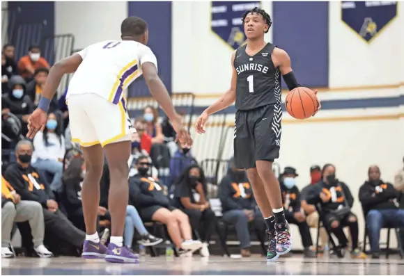  ??  ?? Sunrise Christian's Kennedy Chandler brings the ball upcourt against Montverde Academy. Chandler finished with 13 points.