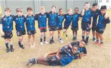  ?? Picture: SUPPLIED ?? Western Lions under-9 Roar celebrate after playing a grand final at the Paul Bowman Challenge in Proserpine.