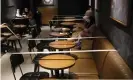  ?? Photograph: Vincent Yu/AP ?? Tables and chairs are taped to ensure social distancing at a Starbucks coffee shop in Hong Kong, 30 March 2020.