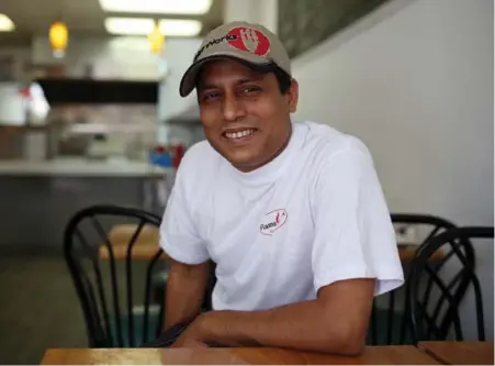  ?? COLE BURSTON PHOTOS/TORONTO STAR ?? Saber Chowdhury is giving his two-year-old burger spot, Flame Shack, in Corktown a quick makeover before expanding his menu for Pan Am.