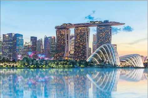  ?? LENA_SERDITOVA / GETTY IMAGES ?? El fondo soberano de Singapur (en la foto, una vista panorámica) fue uno de los más activos el año pasado