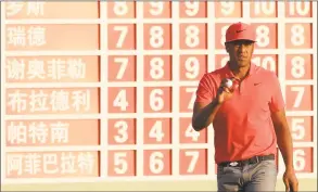  ?? Andrew Redington / Getty Images ?? Tony Finau reacts to his birdie on the 18th green during the third round of the WGC - HSBC Champions Saturday in Shanghai.