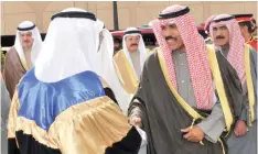  ??  ?? Kuwait University President Professor Dr Hussain Al-Ansari welcomes His Highness the Crown Prince Sheikh Nawaf Al-Ahmad Al-Jaber Al-Sabah to the venue.