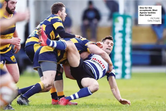  ?? PICTURE: Getty Images ?? One for the scrapbook: Blair Agnew tackles Dan Carter