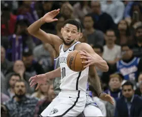  ?? JOSÉ LUIS VILLEGAS — THE ASSOCIATED PRESS ?? Brooklyn Nets guard Ben Simmons makes a spin move against the Sacramento Kings on Nov. 15. Simmons returns to Philadelph­ia tonight and said, “I know what’s coming.”