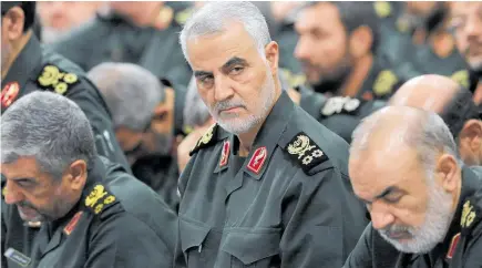  ?? Photo / AP ?? Major General Qassem Soleimani (centre) attends a meeting in Tehran in 2016.