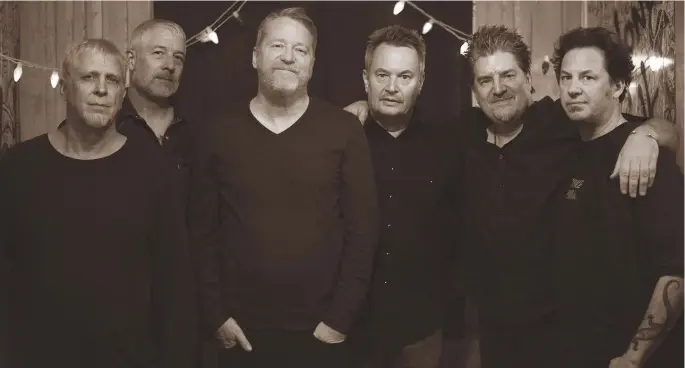  ??  ?? David Lowery (third from left) with Camper Van Beethoven, photo Hillery Terenzi; opposite page, David Lowery, right, with Cracker co-founder Johnny Hickman, photo Bradford Jones