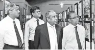  ??  ?? Bank of Ceylon Chairman President Counsel Ronald C. Perera, CEO and General Manager Senarath Bandara, DGM Sales and Channel Management C. Amarasinge and CMO Dr. Indunil Liyanage view the exhibition