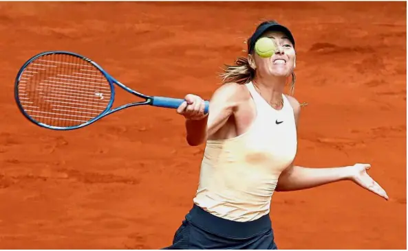  ?? — Reuters ?? Back in the groove: Russia’s Maria Sharapova in action during her second round match against Romania’s Irina- Camelia Begu in the Madrid Open on Monday.